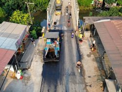 Pengaspalan Jembatan Lembak Ruas Ma. Lembak-Sangkulirang Terus Dikebut